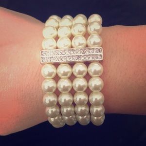 Four strain faux pearl bracket